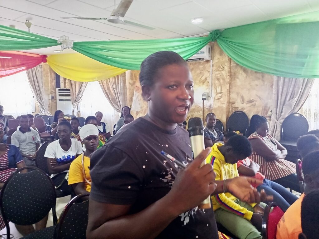 Participant making contribution during an open forum at the Career Exposure program