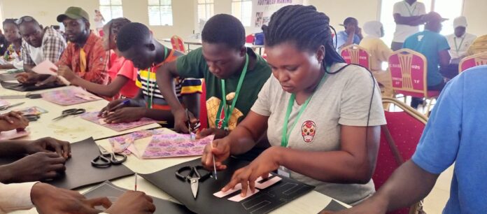 Youth taking part in Adakwa Treasures Foundation footwear making training