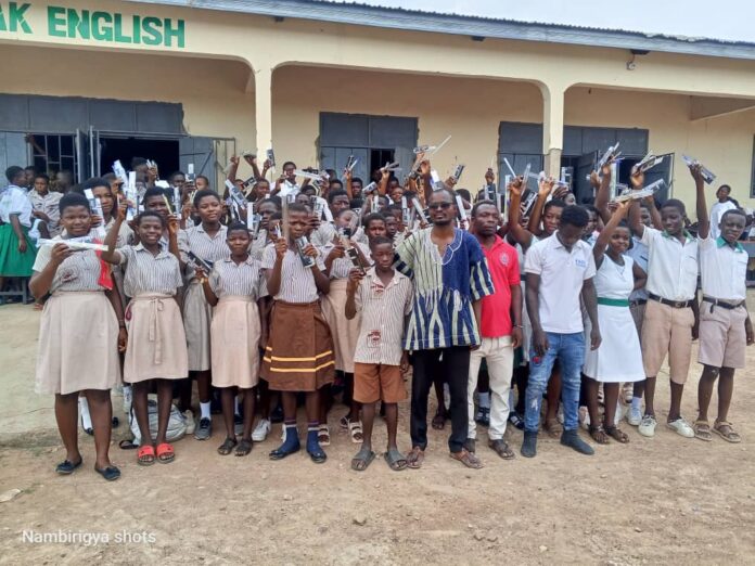 ASSEMBLY MEMBER FOR SOE - YIPAALA ELECTORAL AREA IN THE BOLGATANGA MUNICIPALITY OF THE UPPER EAST REGION, DR. JUSTICE ADUKO WITH THE CANDIDATES OF THE TWO SCHOOLS