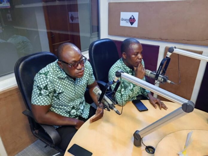 Desmond Yaani (in glasses) and Francis Awuni, Regional PRO and Secretary of GRNMA